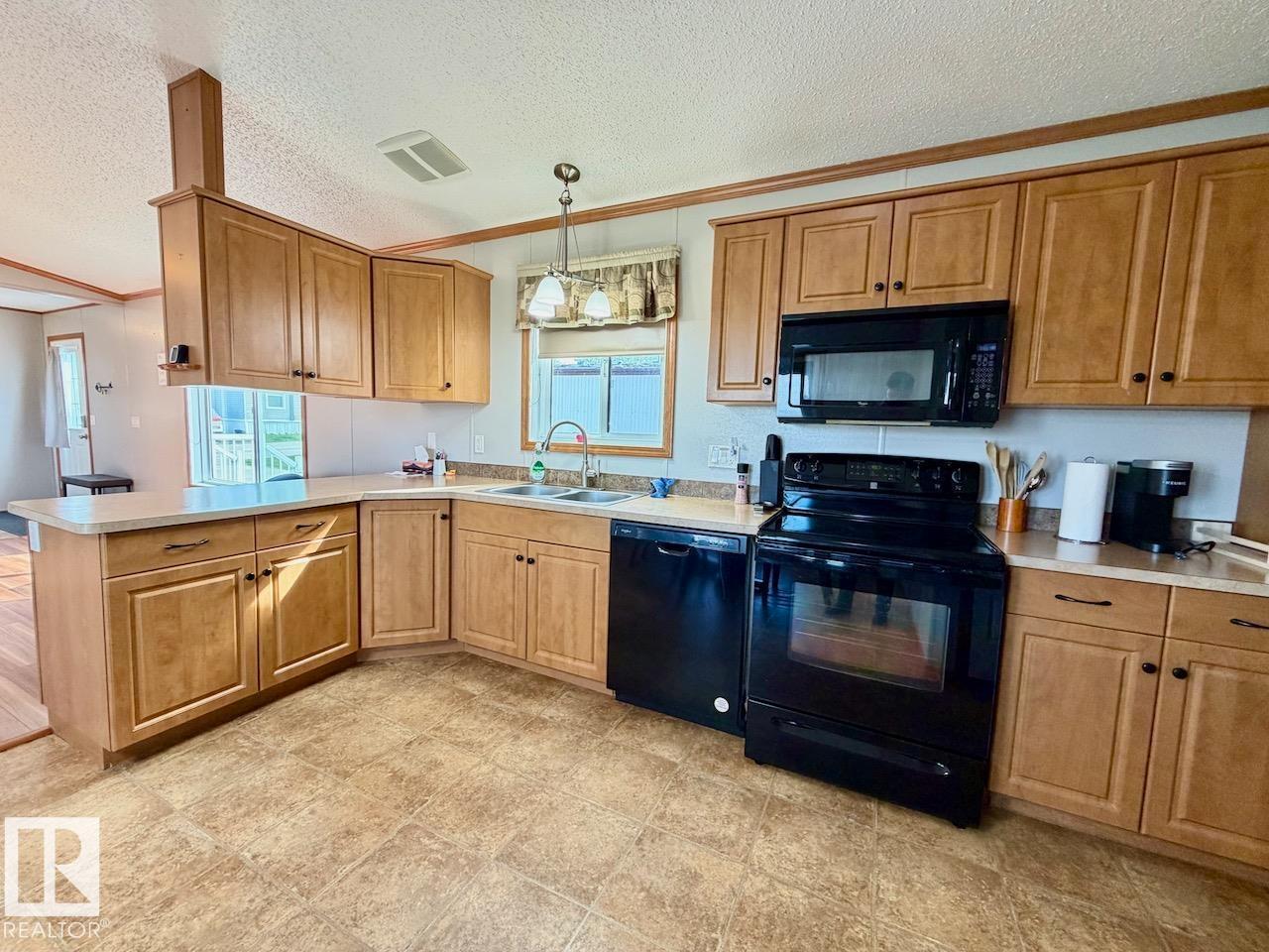 110 2251 50 St, Drayton Valley, Alberta T7A 1W1 - Photo 2 - E4488625